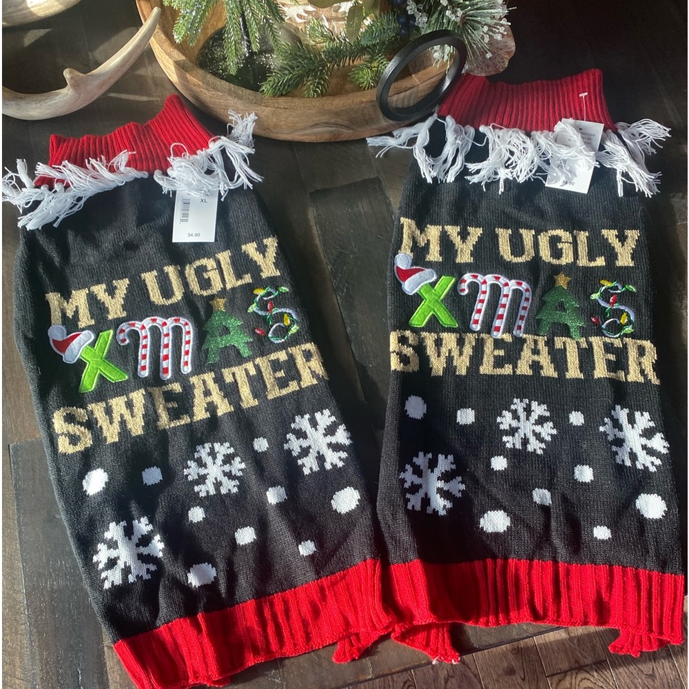 -  Two “cute” Ugly dog sweater. Both XL